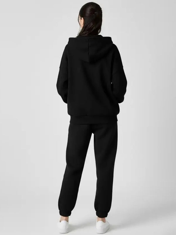 Women Full Sleeve Solid Hooded Sweatshirt